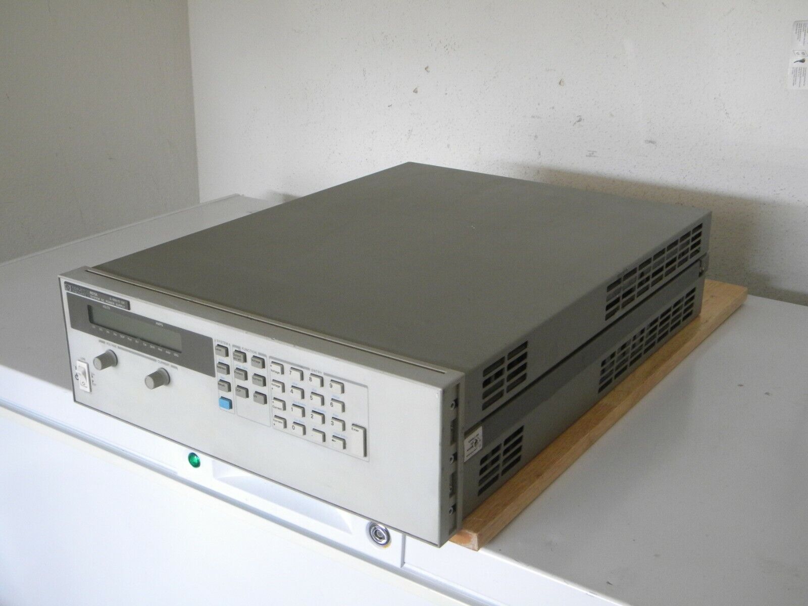 Agilent / HP 6675A Power Supply, 135V, 16A, 2160W Option J06 Agilent / HP 6675A Power Supply, 135V, 16A, 2160W Option J06